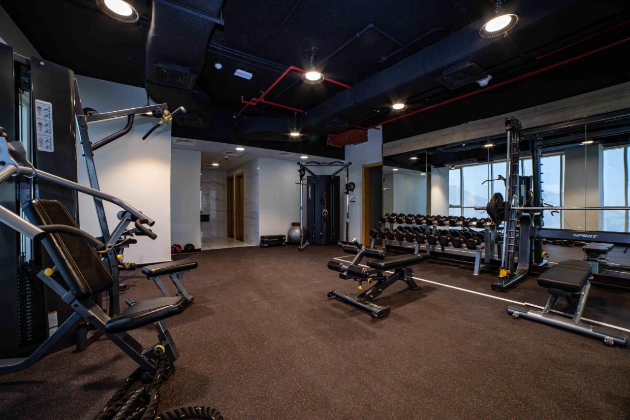 Platinum Coast Hotel Apartments Фуджейра Екстериор снимка The gym at the 100000 sq ft (9,300 sq m) headquarters of the company in Hyderabad, India